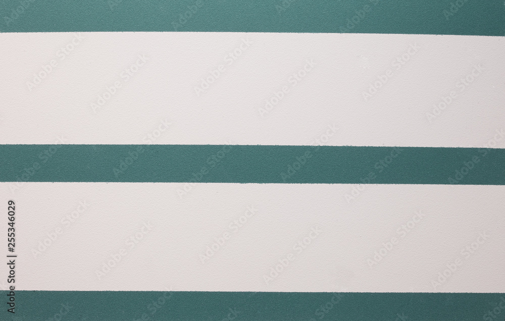 Photo of old blue and white stripes cement wall with fractures. Texture for pattern. Photo of old blue and white stripes cement wall with fractures. Texture for pattern.