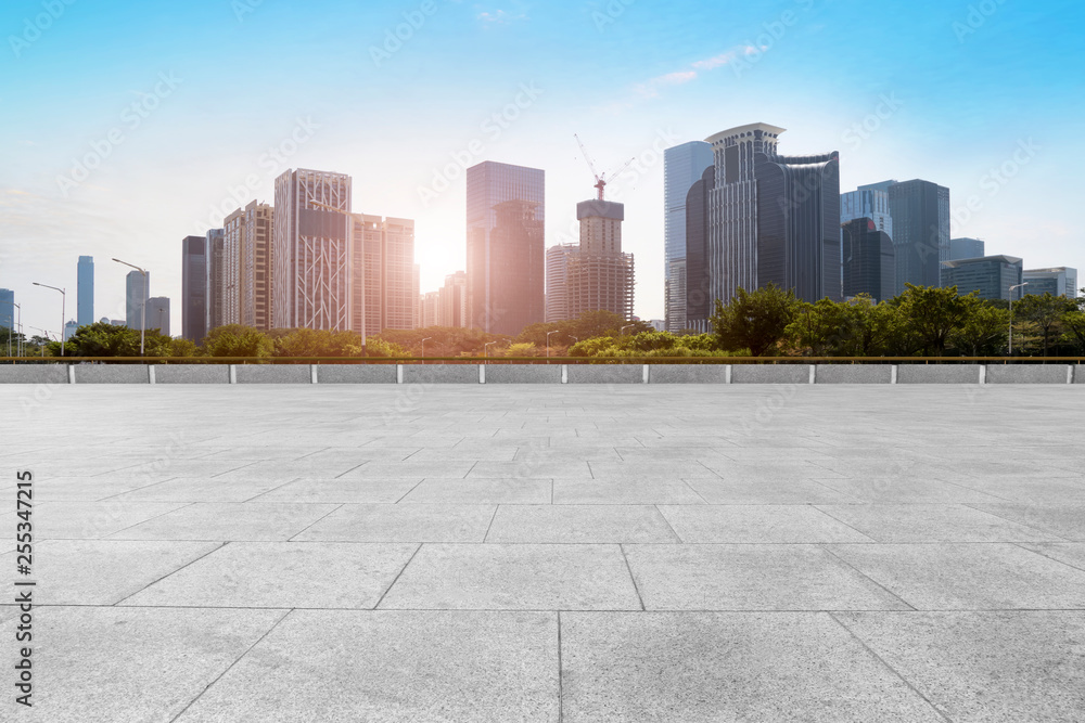 Urban skyscrapers with empty square floor tiles