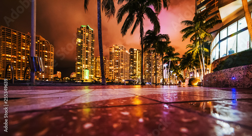 Skyscrapers in downtown Miami seen from the river walk at night photo