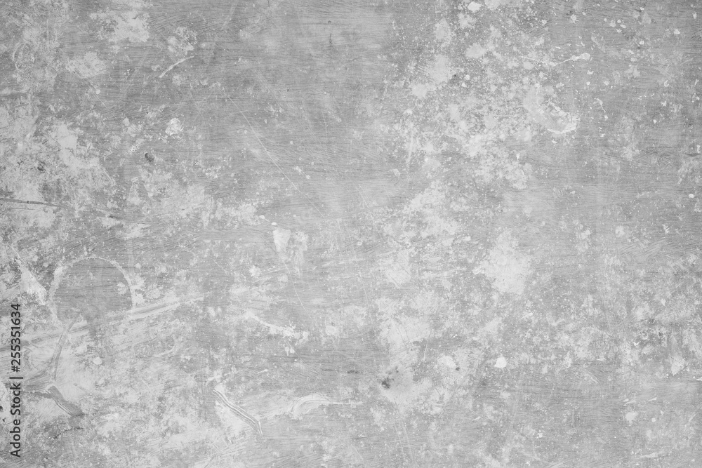 Black and white photo of old scratched linoleum spattered with white paint. Grunge texture background. Background for design