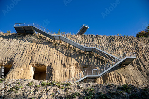Tourist platform stairs and caves at ENCI, Dutch mining area, near Maastricht on a very sunny day