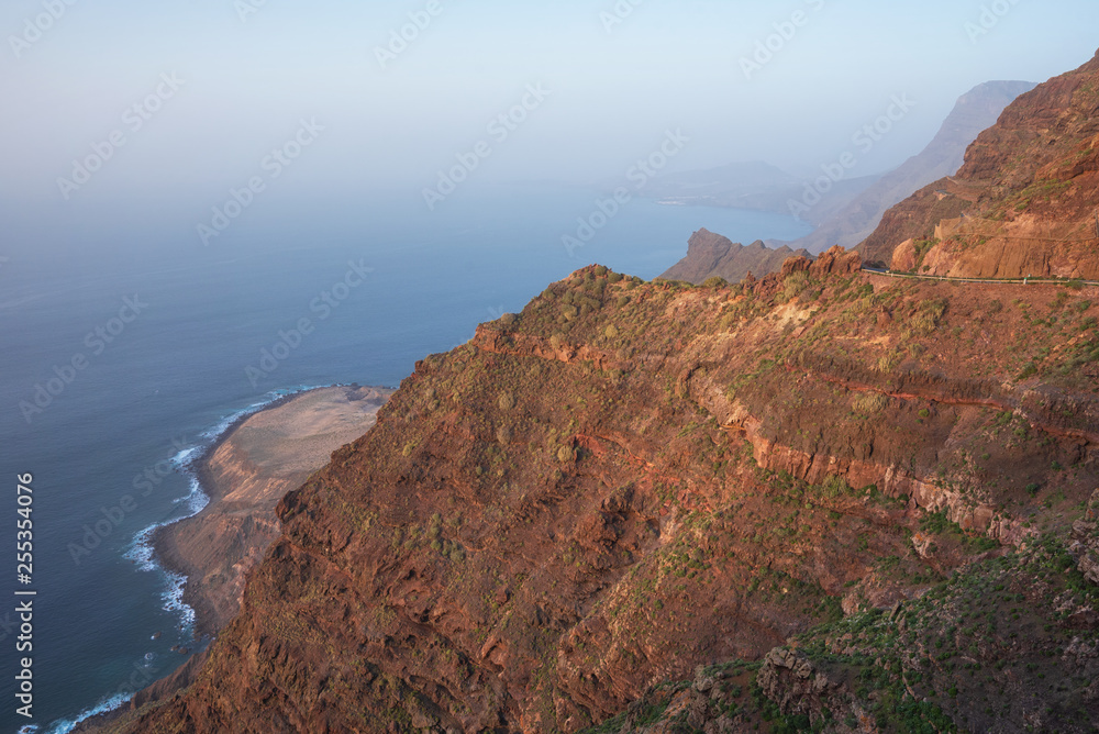 Scenic volcanic coastline landscape, Cliffs in Tamadaba natural park, Grand Canary island, Spain .