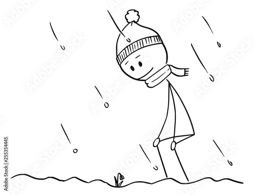 Cartoon stick figure drawing conceptual illustration of happy man who found first Spring snowdrop flower plant flowering in snow.