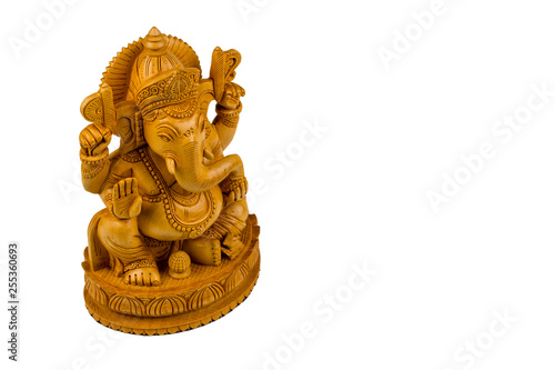 Isolated wooden statue of Ganesha