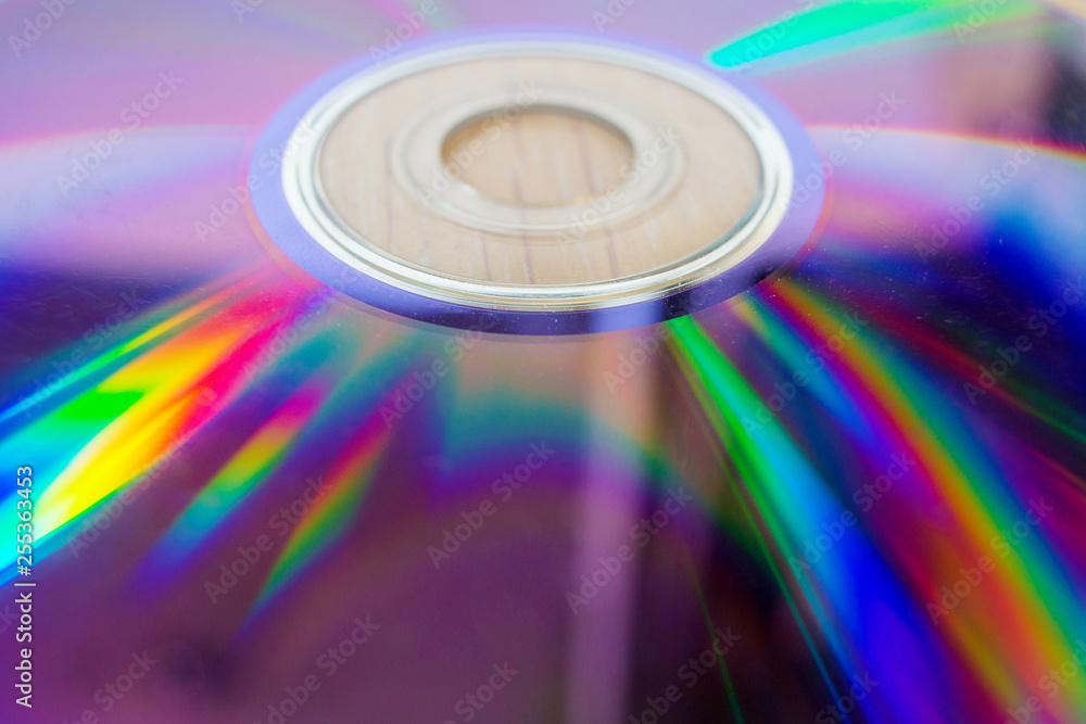Compact disk close up. Scratches on the magnetic party of a disk Compact disk close up. Scratches on the magnetic party of a disk