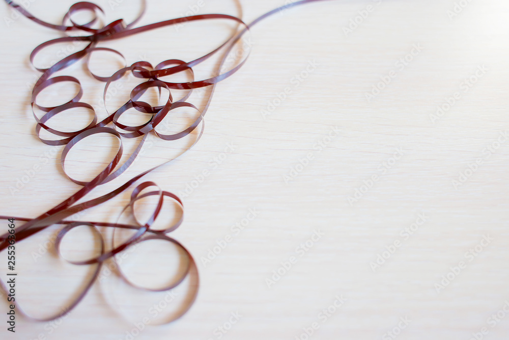 The confused cassette tape. A frame from a magnetic tape The confused cassette tape. A frame from a magnetic tape