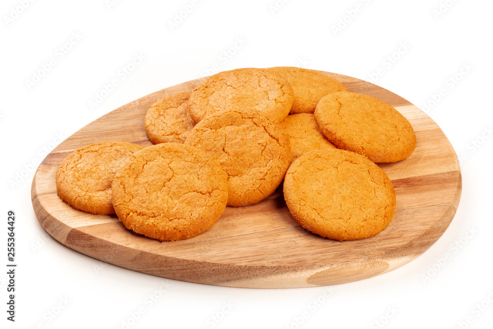 Ginger cookies on a wooden tray, on a white background