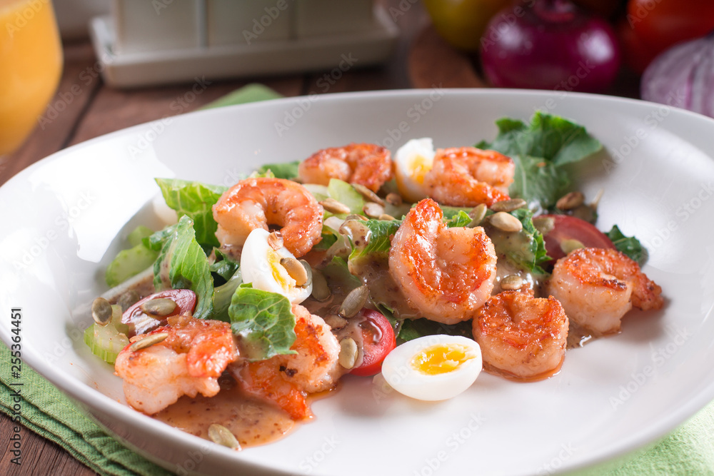 Healthy salad. Recipe for fresh seafood. Grilled shrimp, fresh vegetable salad and egg. Shrimp on the grill. Health food. Wooden background Healthy salad. Recipe for fresh seafood. Grilled shrimp, fresh vegetable salad and egg. Shrimp on the grill. Health food. Wooden background