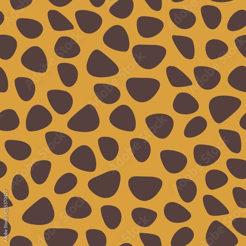 Fur inspired hand drawn seamless vector pattern. Fur inspired hand drawn seamless vector pattern. Cheetah spots on tan color fur.