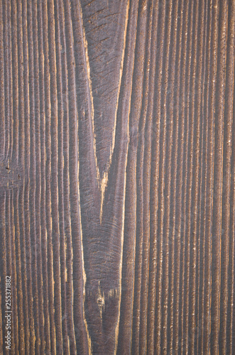 Old wooden board on wall closeup