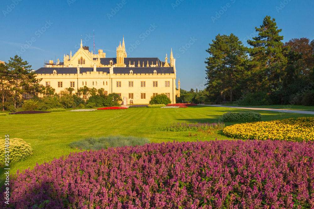 View of Lednice castle with a beautiful garden at sunny day, Czech Republic, Europe.