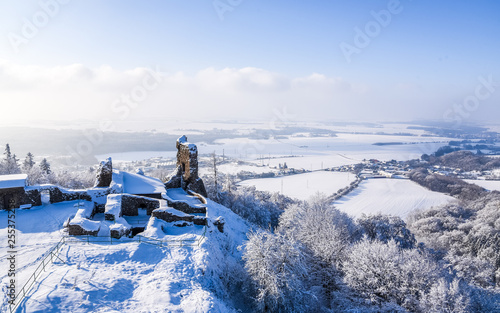 Ruins of medieval castle Lichnice near Tremosnice, Czech Republic. Sunny snowy winter day