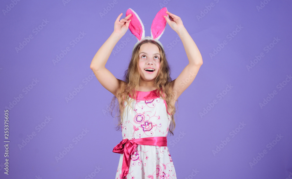 Holiday bunny girl with long bunny ears. Child cute bunny costume. Playful baby celebrate easter. Spring holiday. Happy childhood. Ready for Easter day. Easter activities for children. Happy easter Holiday bunny girl with long bunny ears. Child cute bunny costume. Playful baby celebrate easter. Spring holiday. Happy childhood. Ready for Easter day. Easter activities for children. Happy easter