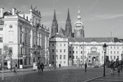 PRAGUE, CZECH REPUBLIC - OCTOBER 12, 2018: The Hradcanske square, Castle and St. Vitus cathedral in evening ligit.