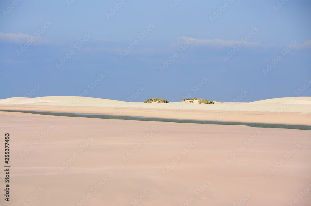 Amazing landscape. Water flowing through the sand. Minimalism lines.