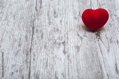 Valentines day red heart on old wood. Holidays card with copy space