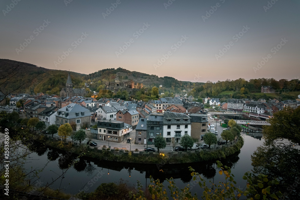 La Roche en Ardennes at dusk with calm Ourthe river