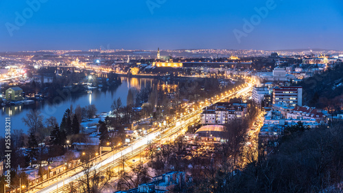 Vltava River and Vysehrad in Podoli. Winter evening view from Branik rocks. Prague  Czech Republic