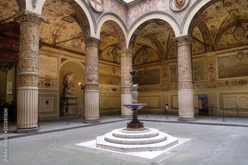 Courtyard of the Palazzo Vecchio (Old Palace) a Massive Romanesque Fortress Palace, is the Town Hall of Florence, Italy photo