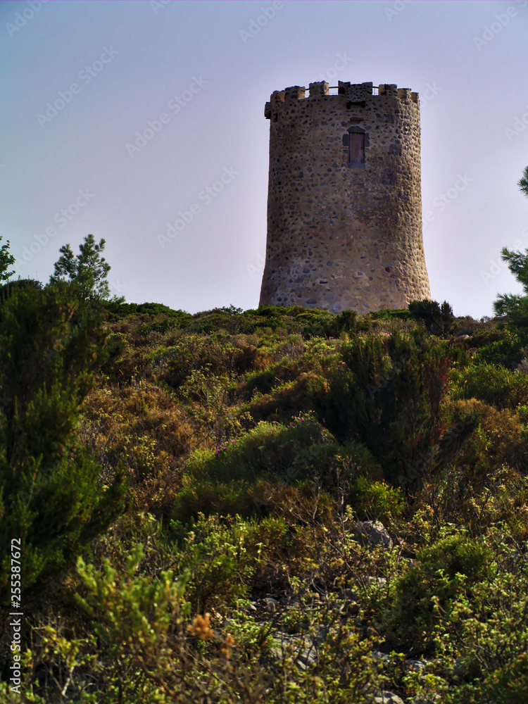 Fortified cylindrical stone watchtower in Chios Island, Greece. Typical Fortified cylindrical stone watchtower in Chios Island, Greece. Typical