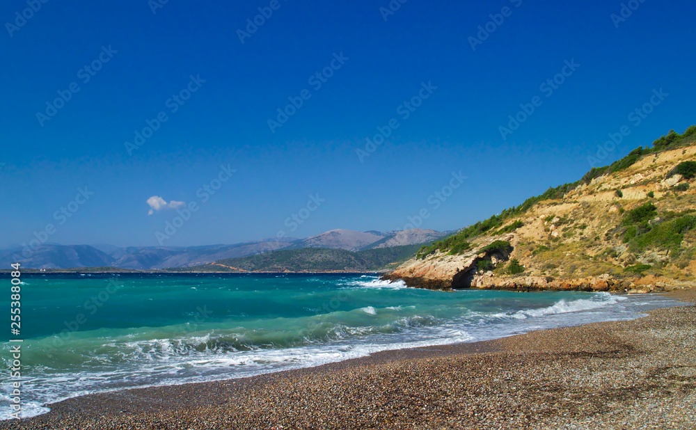 Didyma (literary means twin) beach in Chios island, Greece. Beautiful isolated stone beach with no people.