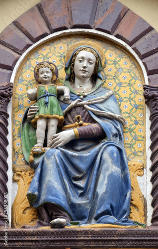 Madonna and Child by Giovanni Della Robbia on the portal of San Barnaba Church in Florence, Italy