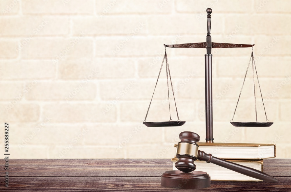 Justice Scales and books and wooden gavel on table. Justice concept Justice Scales and books and wooden gavel on table. Justice concept