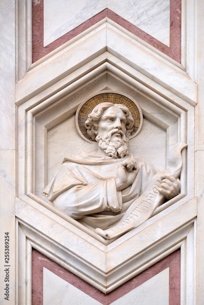 Saint Matthew the Evangelist, relief on the facade of Basilica of Santa Croce (Basilica of the Holy Cross) - famous Franciscan church in Florence, Italy