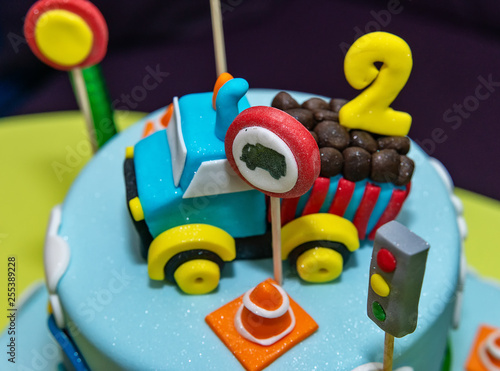 Kids cake decorated with Construction machinery
