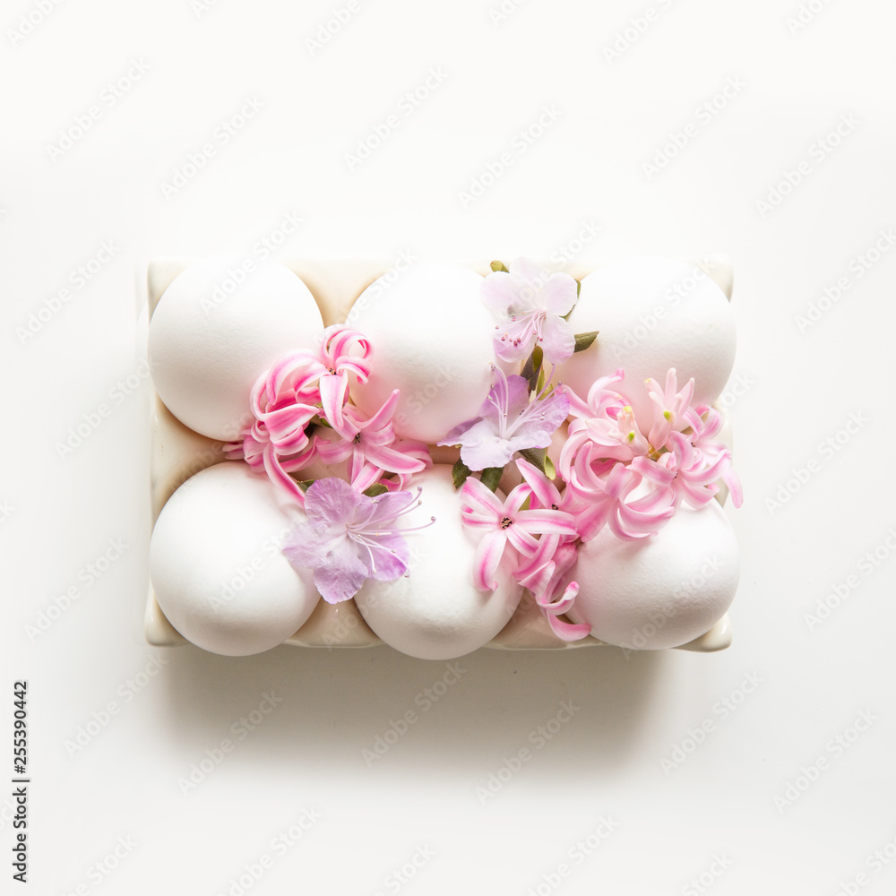 Organic white eggs with flowers. Easter. Spring. Organic white eggs with flowers. Easter. Spring.