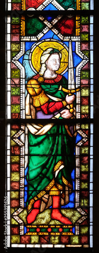 Saint Michael the Archangel, stained glass window in the Basilica di Santa Croce (Basilica of the Holy Cross) - famous Franciscan church in Florence, Italy