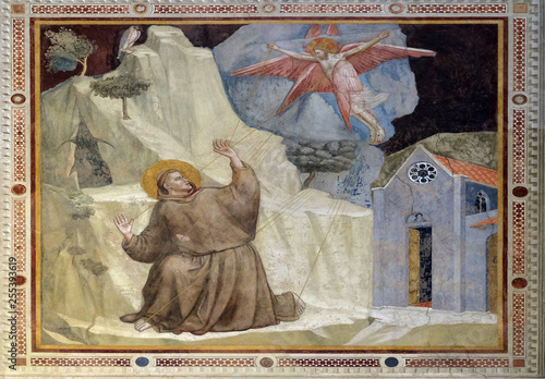 St. Francis Receiving the Stigmata, fresco by Giotto, in the Bardi Chapel of the Basilica di Santa Croce (Basilica of the Holy Cross) in Florence, Italy photo
