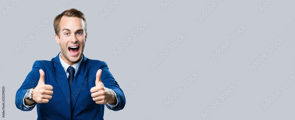 businessman with thumbs up gesture - obrazy, fototapety, plakaty 