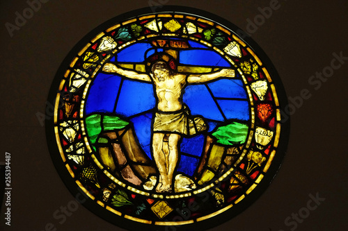 Crucifixion, stained glass window by Alesso Baldovinetti, Basilica di Santa Croce (Basilica of the Holy Cross) - famous Franciscan church in Florence, Italy