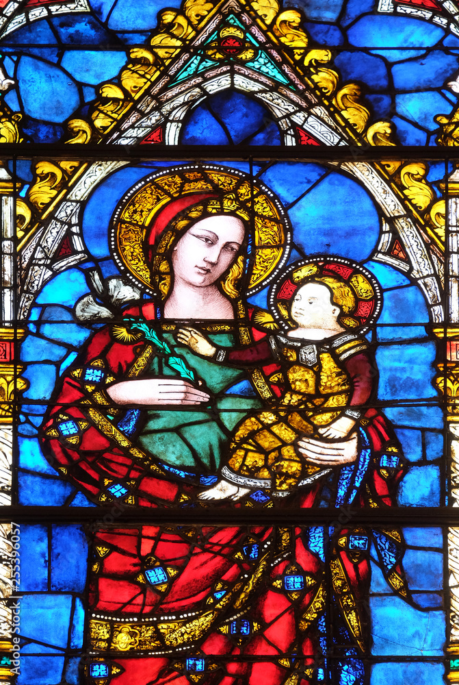 Madonna and Child, stained glass window in Santa Maria Novella Principal Dominican church in Florence, Italy
