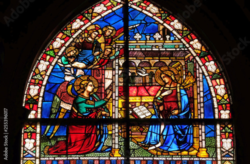 Annunciation to the Virgin Mary stained glass window in Santa Maria Novella Principal Dominican church in Florence, Italy