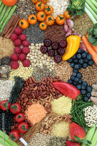 Fototapeta Naklejka Na Ścianę i Meble -  Liver detox health food concept with fruit, vegetables, herbs, spices, legumes, seeds, nuts, grains &  cereals. Foods high in antioxidants, anthocaynins, vitamins &  dietary fibre. Top view.