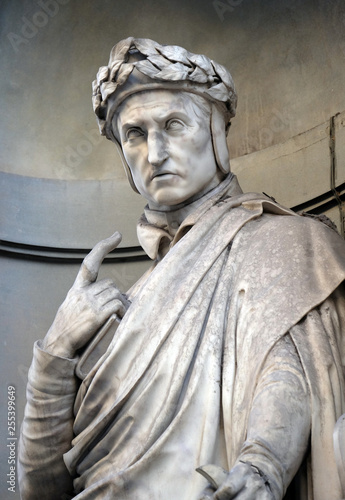 Dante Alighieri in the Niches of the Uffizi Colonnade. The first half of the 19th Century they were occupied by 28 statues of famous people in Florence, Italy photo