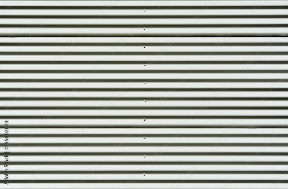 Corrugated white painted metal sheet texture background Corrugated white painted metal sheet texture background