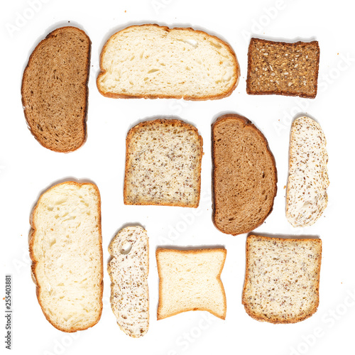 Set of several slices of different bread on a white background.