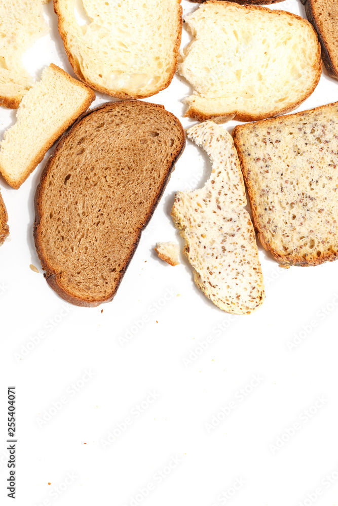 Set of several slices of different bread on a white background. Set of several slices of different bread on a white background.