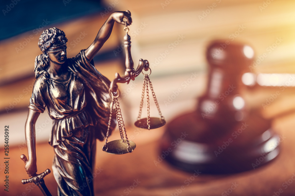 Law concept - Themis statue, judge hammer and books. Law concept - Themis statue, judge hammer and books.