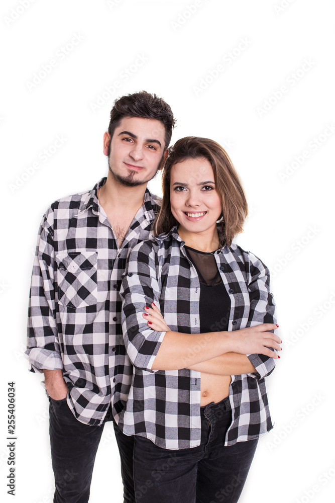 Couple in skirts standing stright isolated on white Couple in skirts standing stright isolated on white