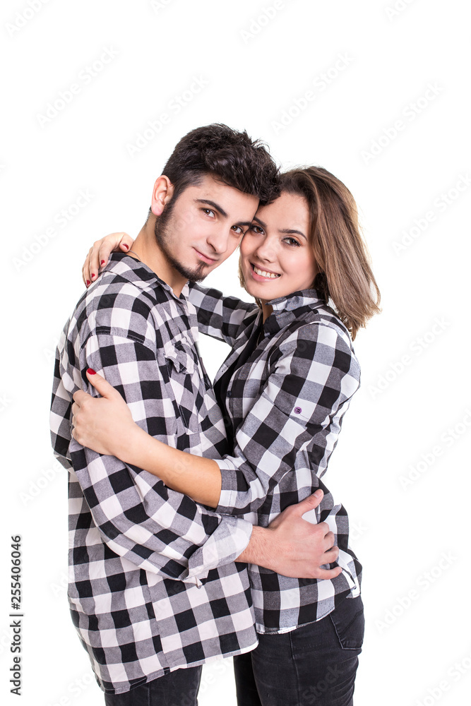 Couple hugging and smiling isolated on white Couple hugging and smiling isolated on white
