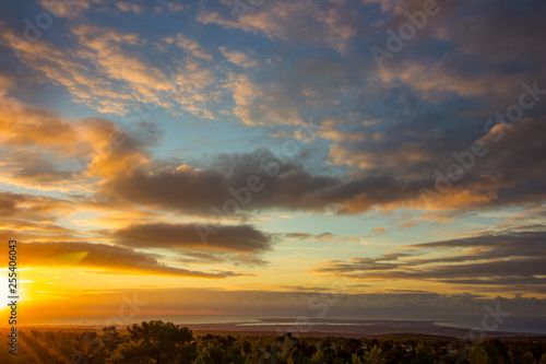 A beauty landscape from the mountains to the Mediterranean sea, outdoors sunrise of Cyprus for this background view. Landscape of the rising sun over the sea, dark clouds but clear skies, 