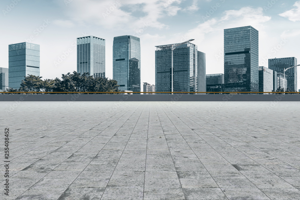 Urban skyscrapers with empty square floor tiles Urban skyscrapers with empty square floor tiles