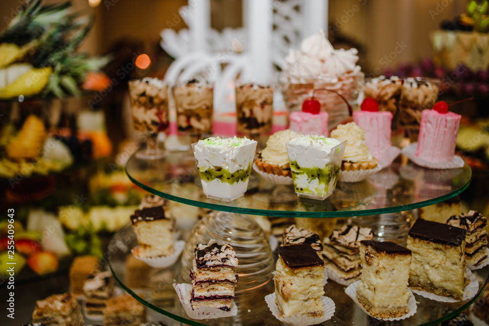 The scrumptious cupcakes are laid out on the trays