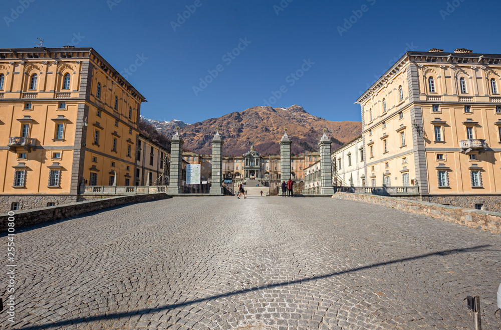 Panoramic view of the inner courtyard of the seventeenth-century monumental complex dedicated to the Virgin Mary, of the Sanctuary of Oropa in Piedmont, Italy.