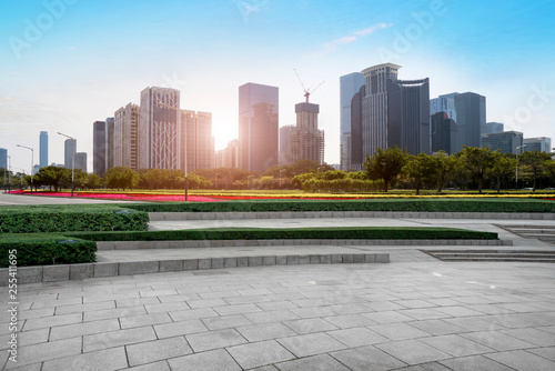 Urban skyscrapers with empty square floor tiles