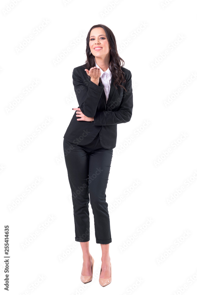 Charming lovely elegant business woman smiling and sending kiss at camera. Full body isolated on white background. Charming lovely elegant business woman smiling and sending kiss at camera. Full body isolated on white background.